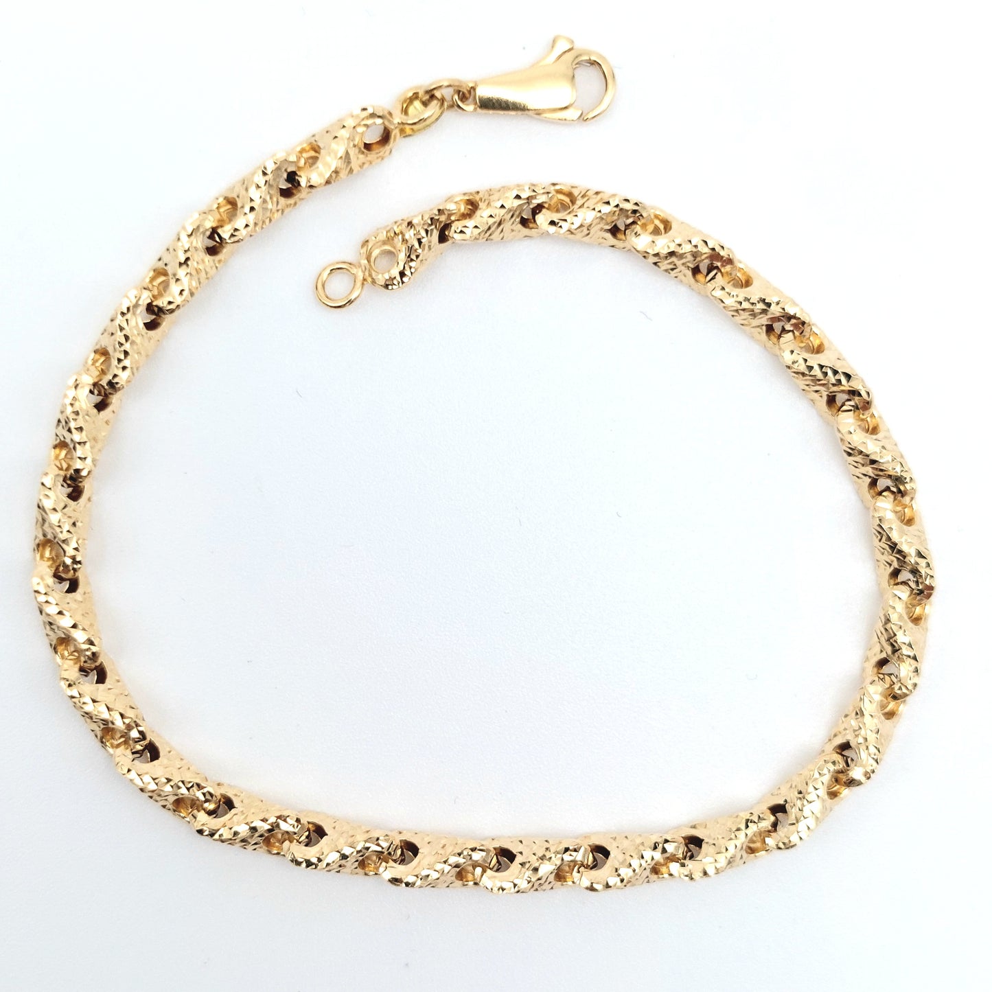 Bracciale da donna in oro 18 KT finitura diamantata ,cm 20 spessore 7 mm .BR-D-ORO030.