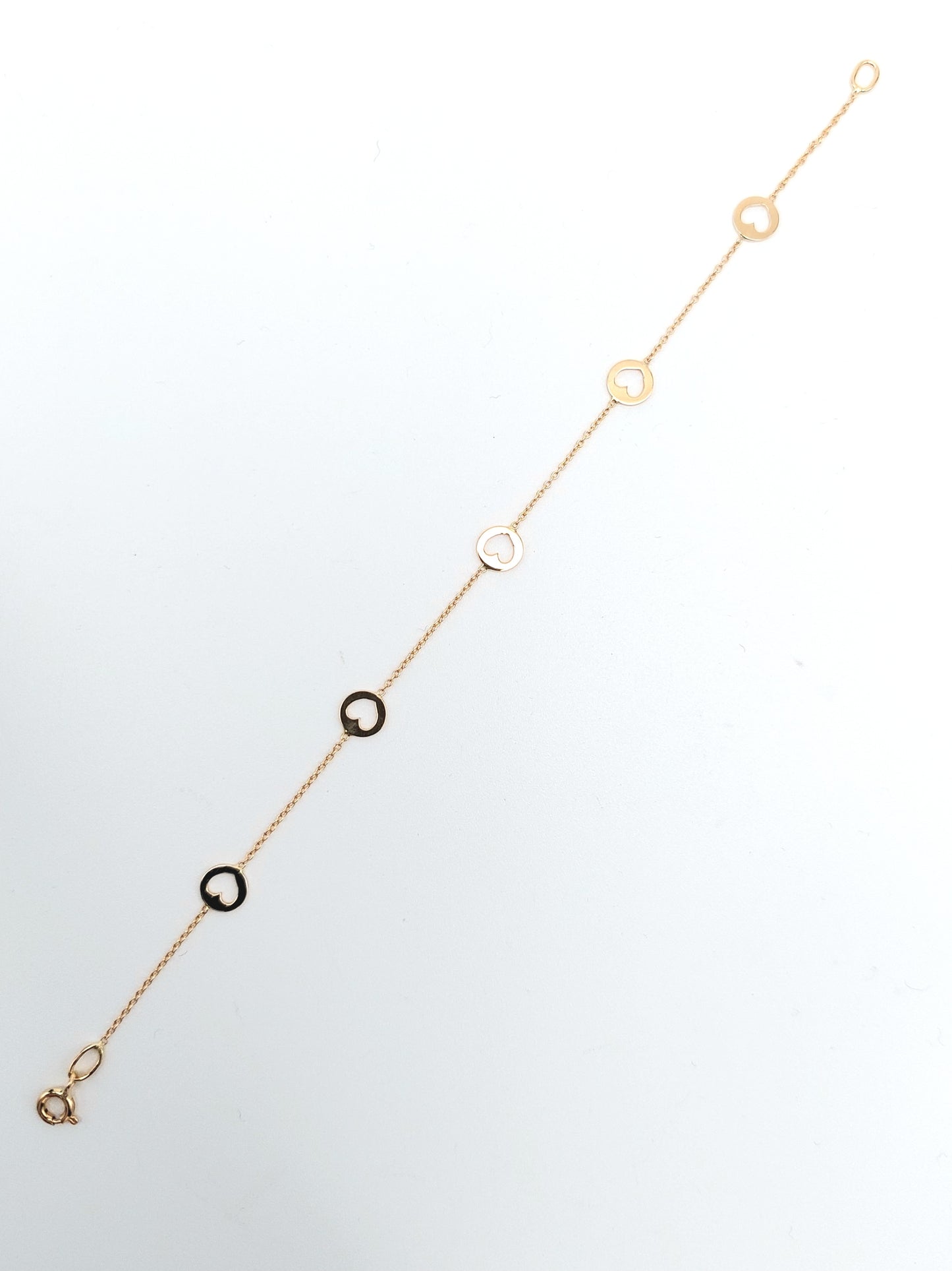 Bracciale da donna a catena con elementi a cuore in oro giallo 18 KT. BR-D-ORO048.