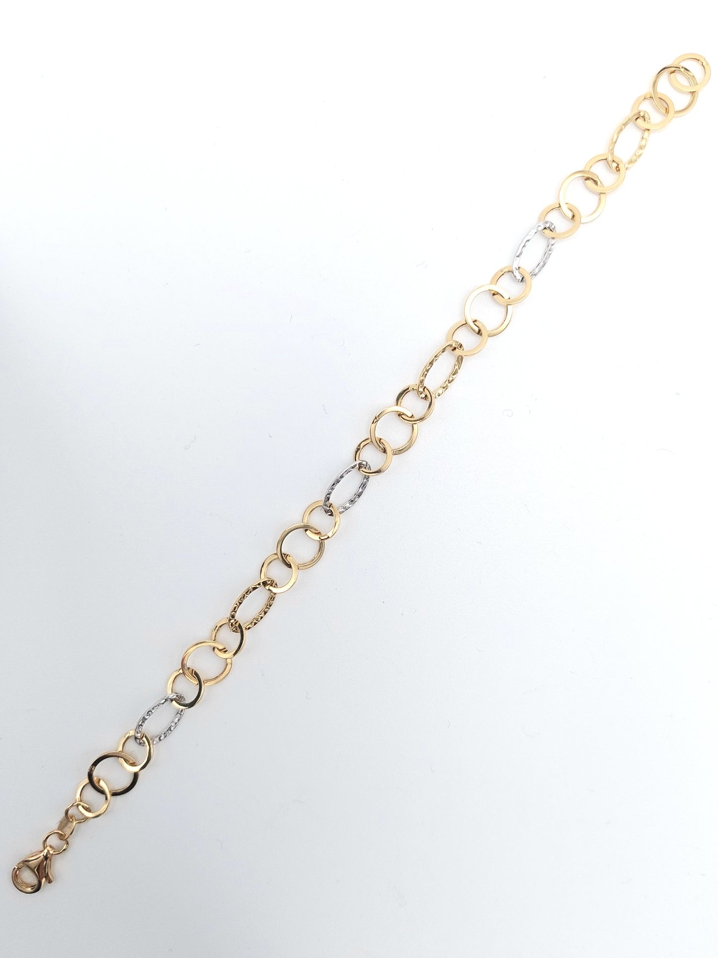 Bracciale a catena da donna in oro giallo e bianco 18 KT. BR-D-ORO059.