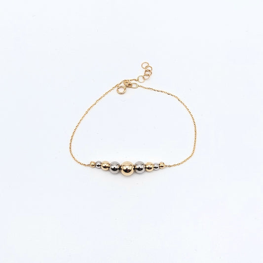 Bracciale da donna in oro giallo e bianco 18 kt. BR-D-ORO005.