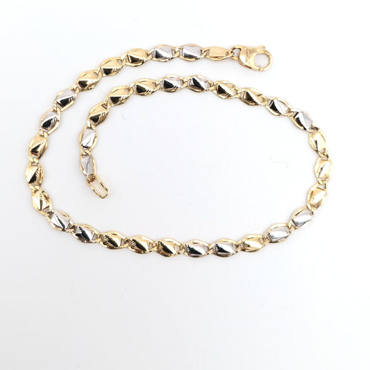 Bracciale da uomo in oro giallo e bianco 18 kt. BR-U-ORO003.